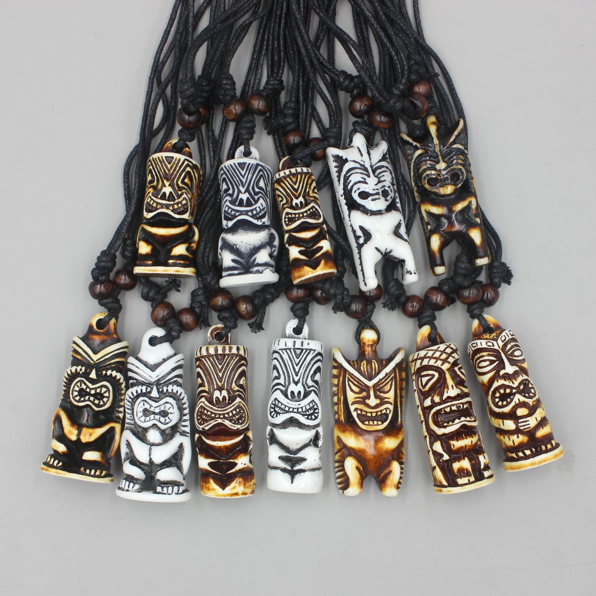 Vintage Fashion Nz - 12ชิ้น/ล็อตฮาวาย Tiki Totem สร้อยคอสำหรับผู้ชายผู้หญิงเทียมจามรีกระดูกจามรีแกะสลัก NZ Maori