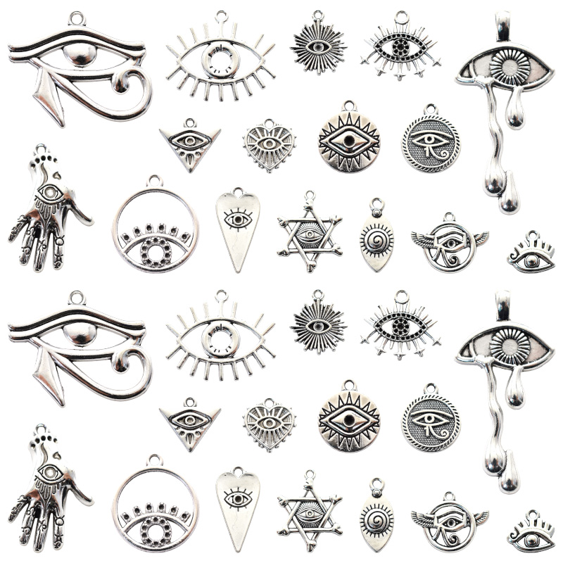 Vintage Fashion Nz - จี้เครื่องรางทิเบตโลหะอัลลอยผสมรูปตาฮอรัส16ชิ้นสำหรับทำสร้อยข้อมือสร้อยคอแบบทำมืออุปกรณ์ทำหัตถกรรม